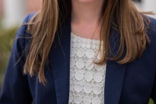A professional headshot of Junior Fellow Kirsten Burke